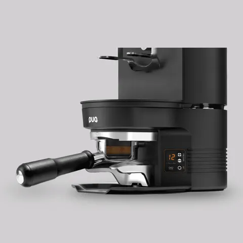 Puq Press M3 under a Mahlkönig E65S grinder