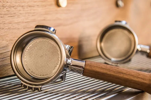 Dalla Corte XT Barista portafilters with wooden handles, close-up