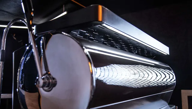Dalla Corte Zero Barista side disc and steam wand, close-up