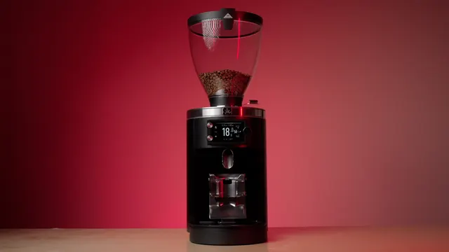 Mahlkönig E80W GbS on a red background with the display switched on
